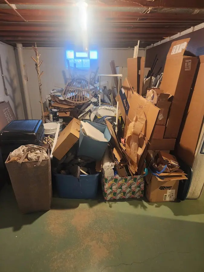 Roll-off dumpster container at job site for 4 Yard Dumpster Rental in Franklin